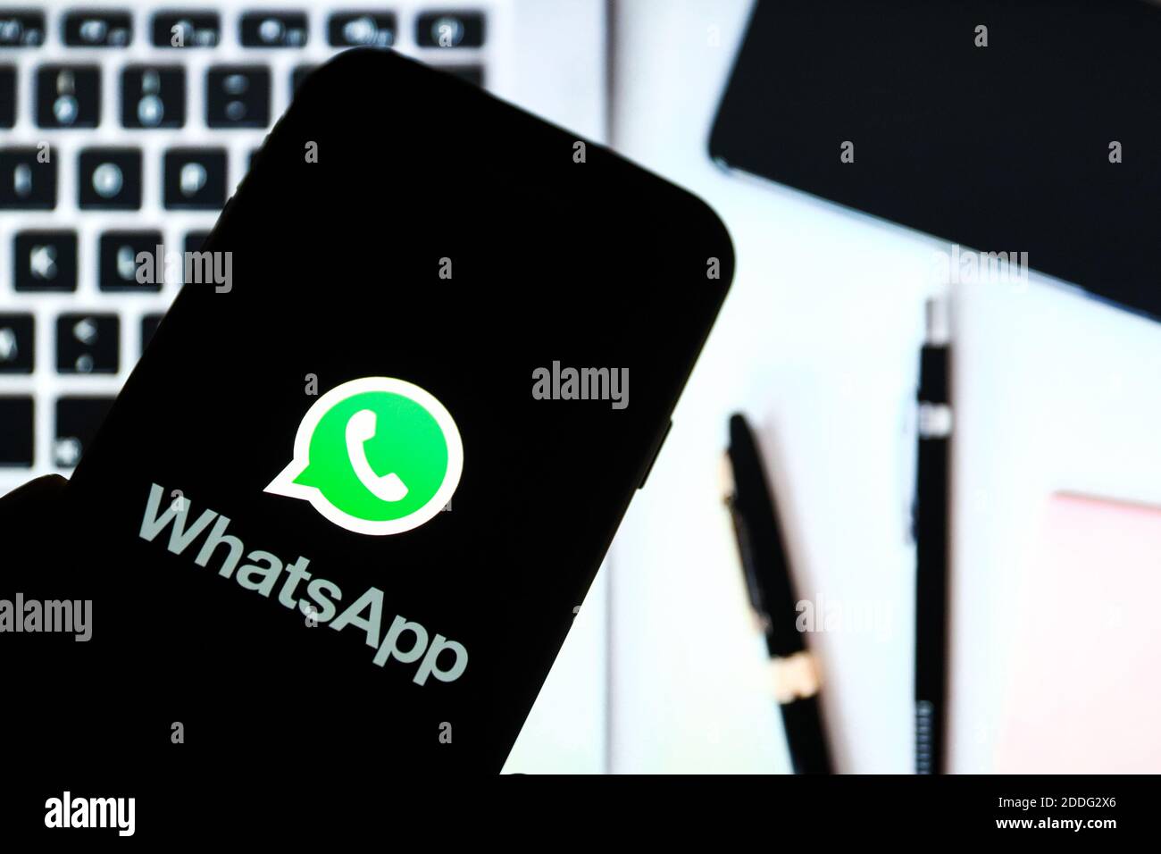 In this photo illustration a Whatsapp online communicator app logo seen displayed on a smartphone. Stock Photo