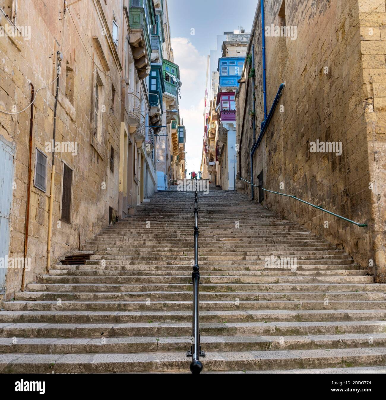 Flight of old stone steps in Valletta the capital of the Island of Malta. Stock Photo