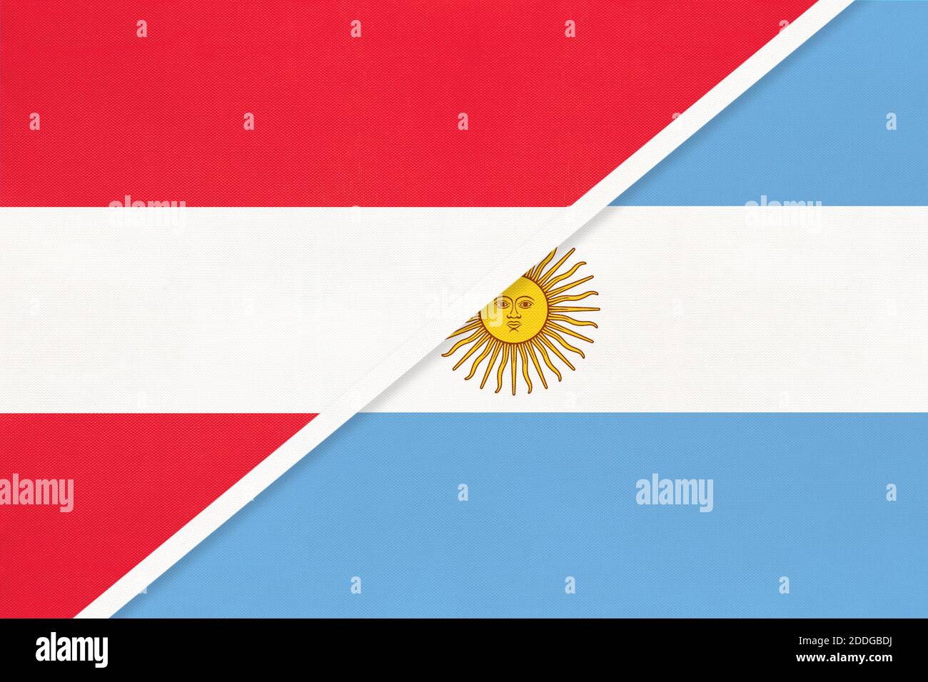 Austria and Argentina or Argentine Republic, national flags from textile. Relationship, partnership and match between two countries. Stock Photo