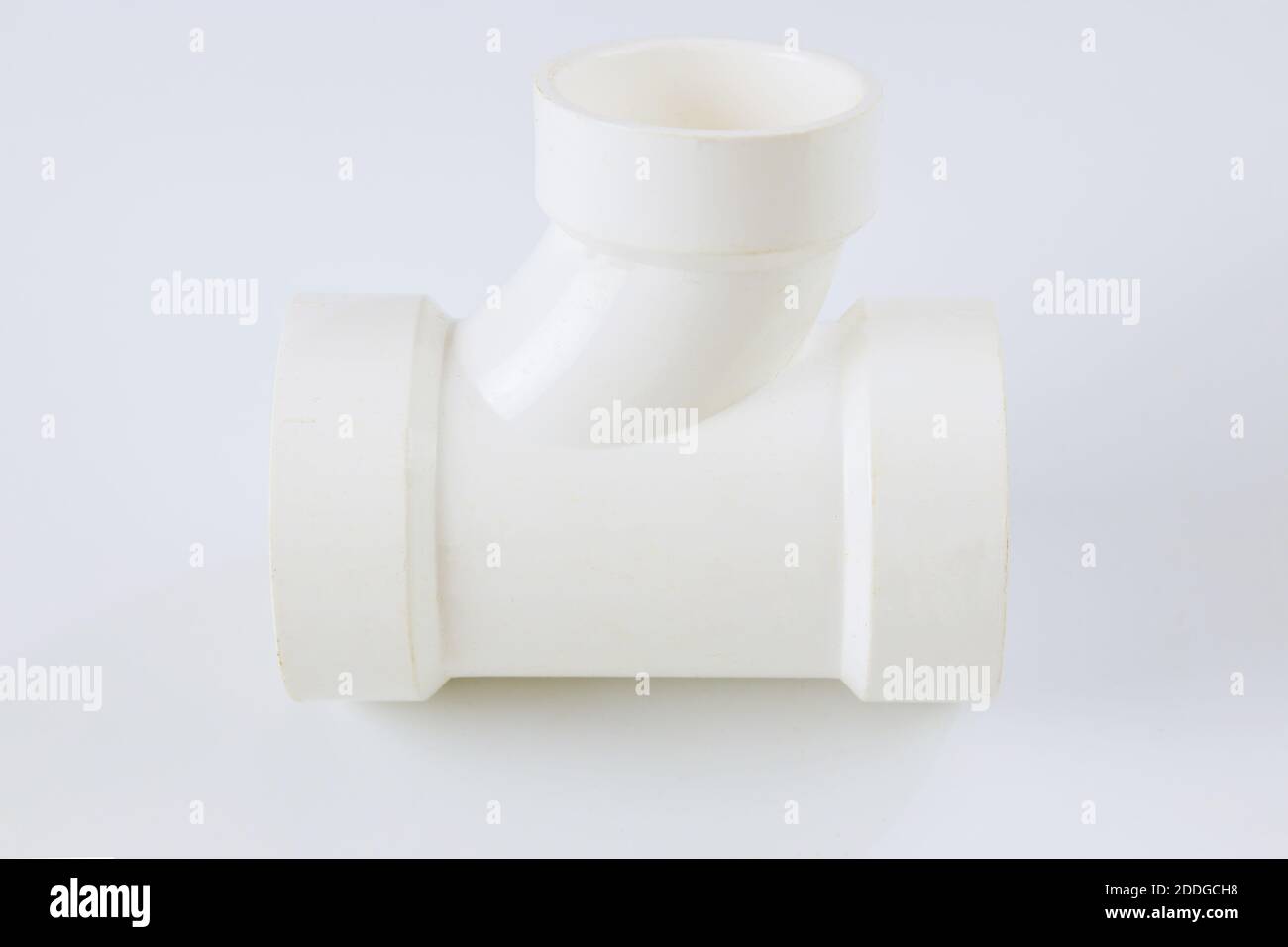 Plumbing drain waste water PVC connecting plastic pipes on a white
