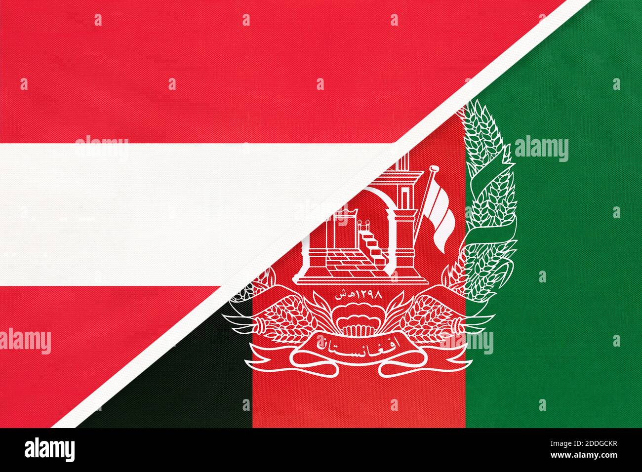 Austria and Afghanistan, national flags from textile. Relationship, partnership and match between two countries. Stock Photo