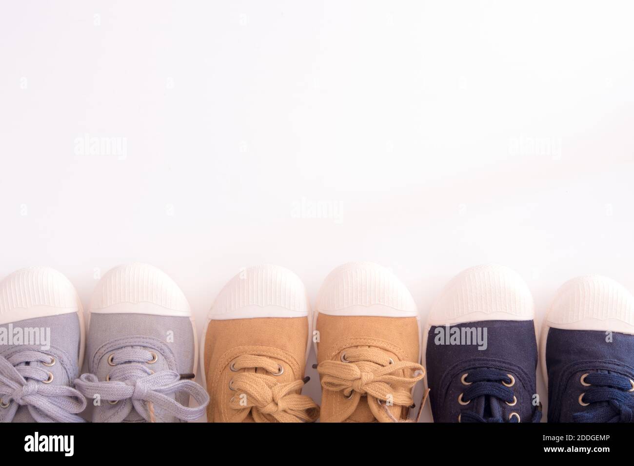 Casual canvas three colors with white shoe head Stock Photo Alamy