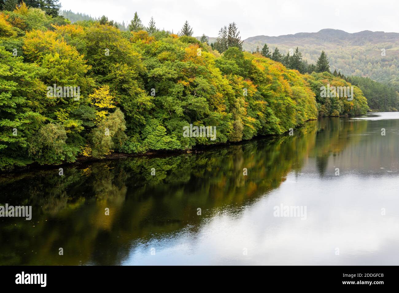 Autumn reflections on Loch Faskally near Pitlochry in Perthshire, Scotland, UK Stock Photo