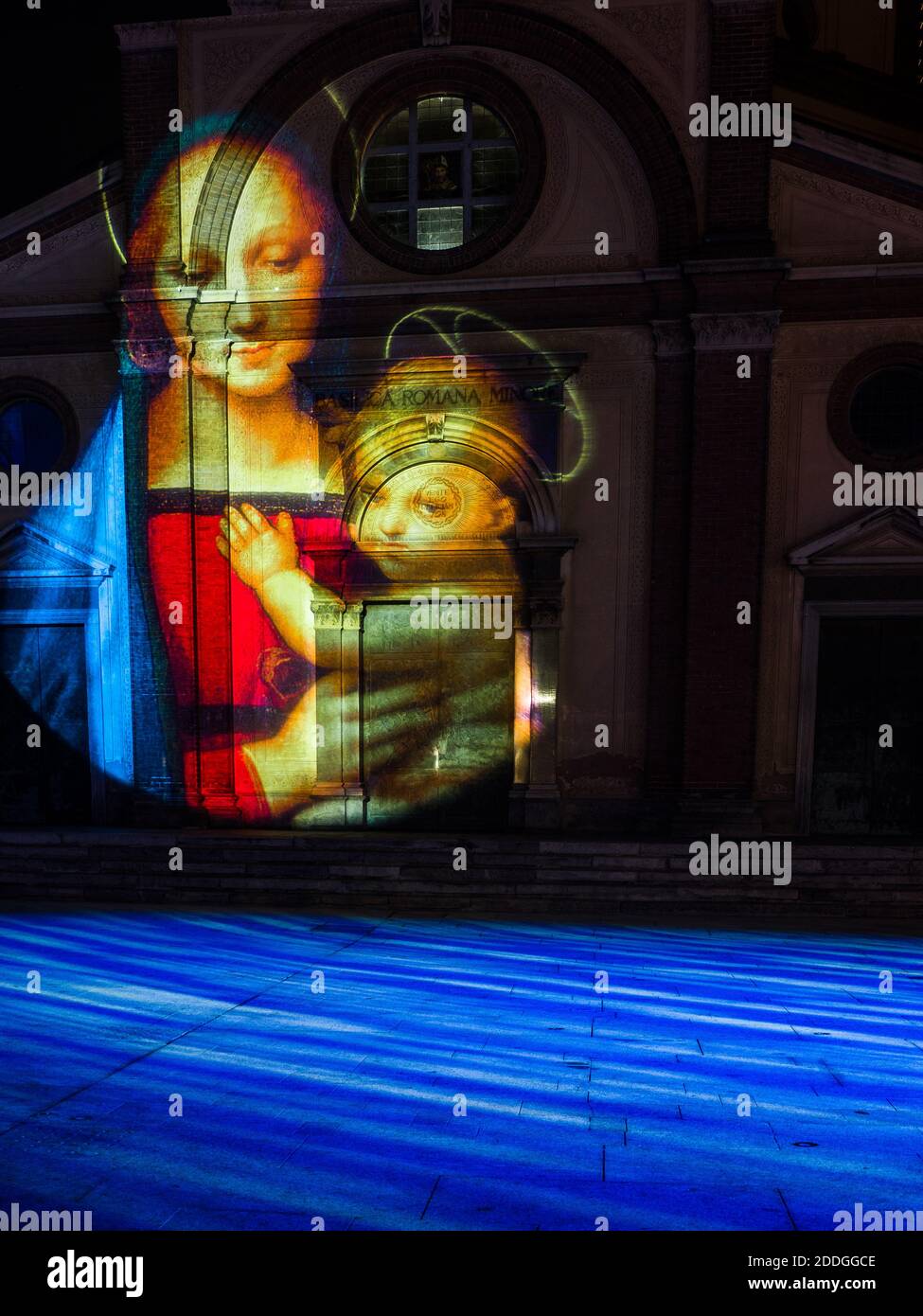 Christmas projection of the Virgin and Child on the facade of a church in Legnano, Lombardy, Italy Stock Photo