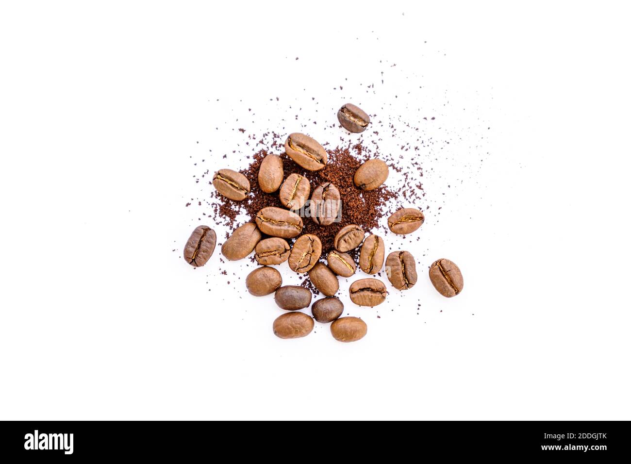 Roasted coffee beans with ground coffee on white background Stock Photo