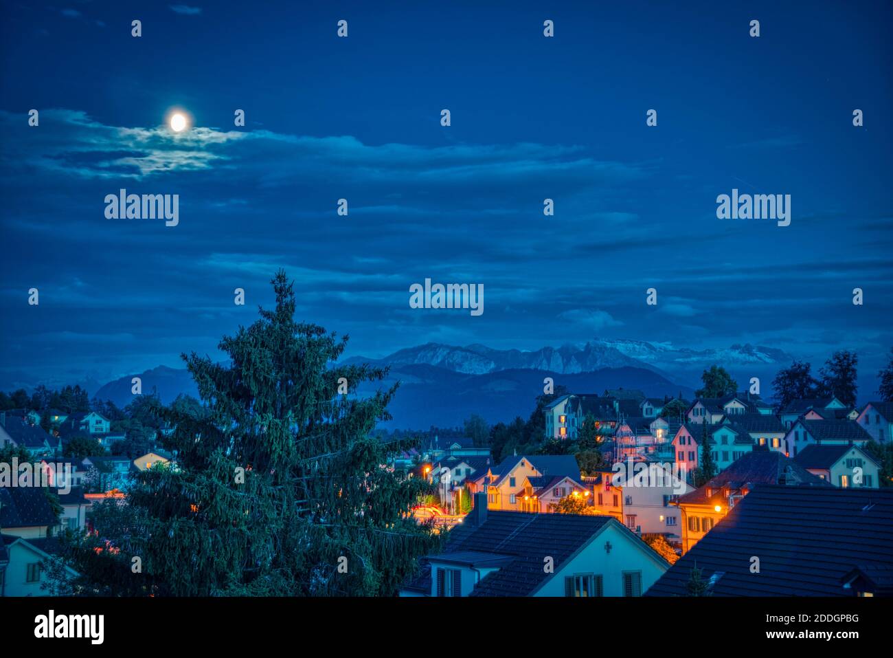 Nightscape over beautiful village with background mountains, Rüti, Zurich,  Switzerland Stock Photo - Alamy