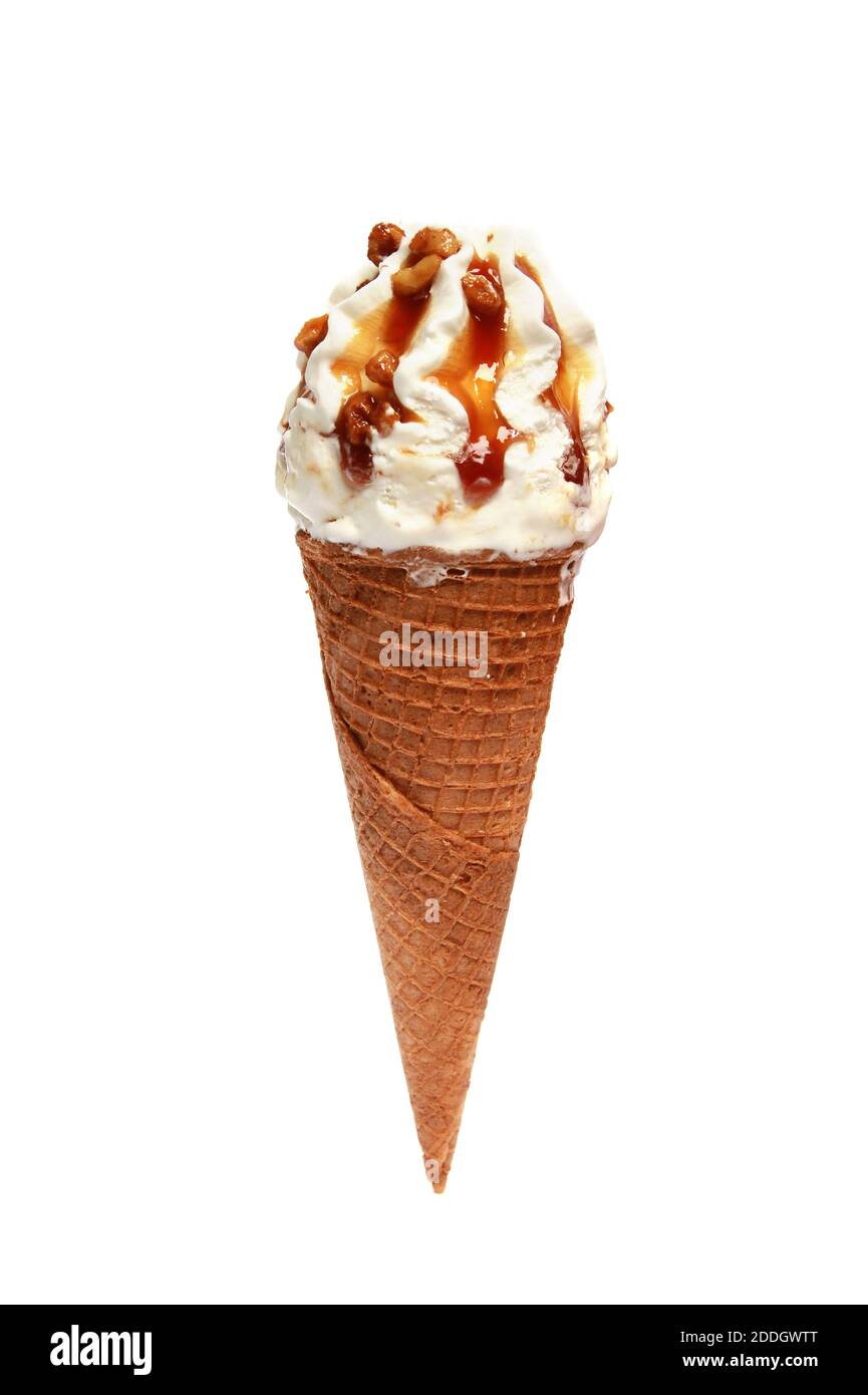 A vertical shot of a caramel ice cream cone with nuts isolated on white ...