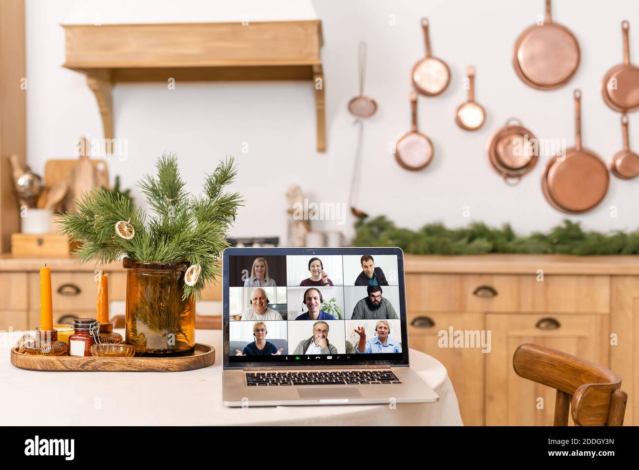 laptop with video conferencing stands on the dining table Stock Photo