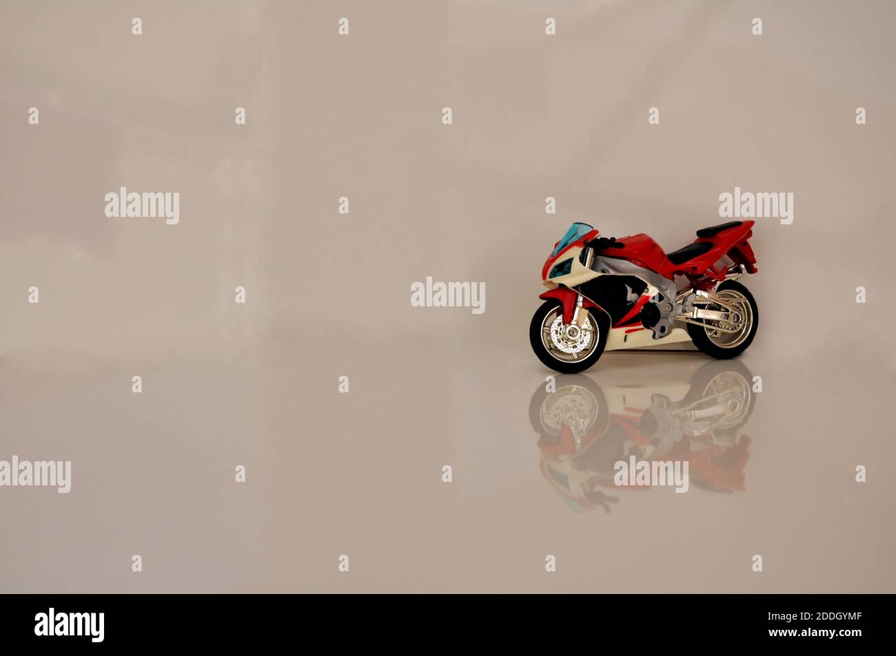 Sports motorcycle for use in racing or even in cities, known as open class in negative space in glass base Stock Photo