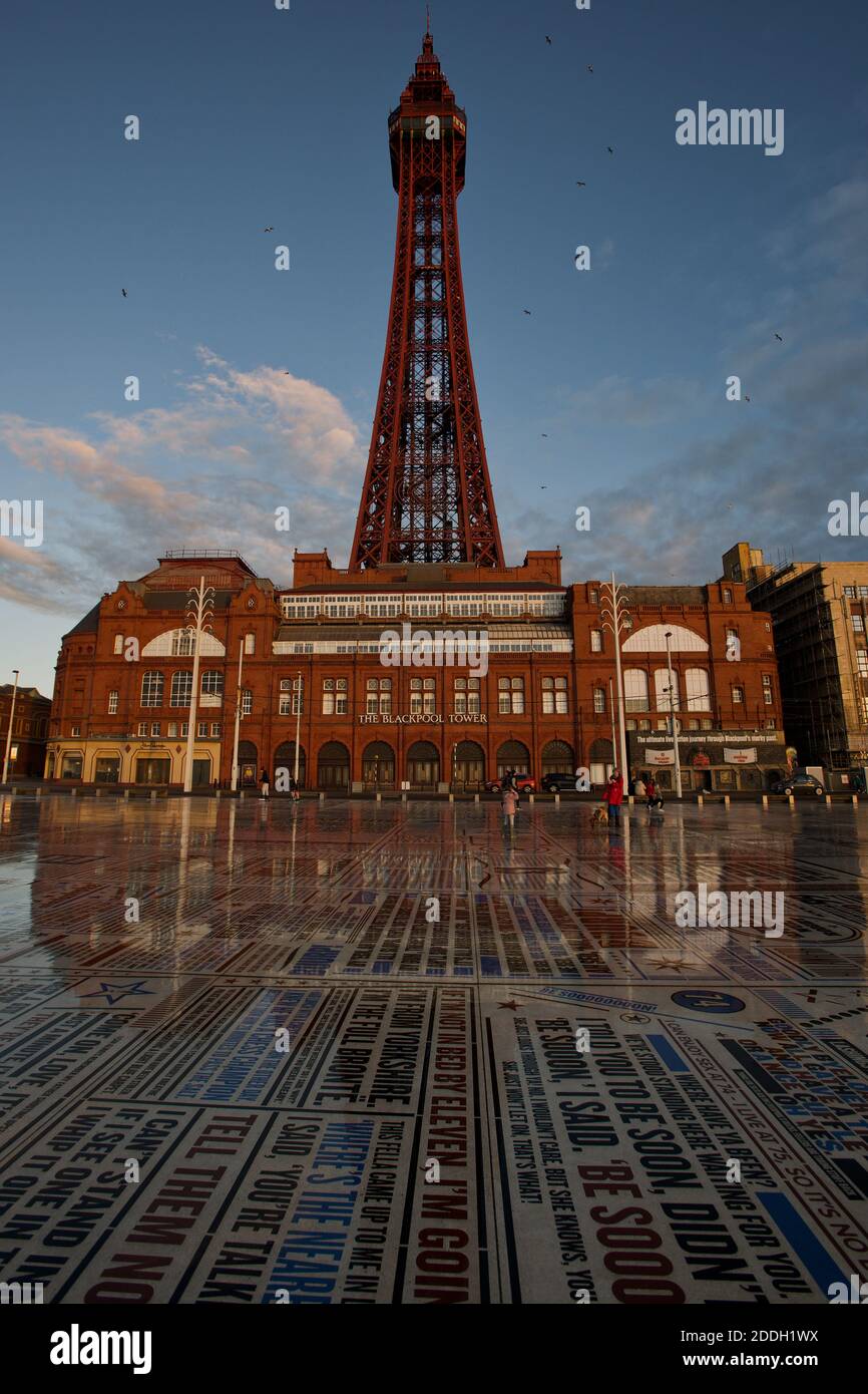 Blackpool Tower building and Comedy carpet, by artist Gordon Young, in sunset time, Blackpool, England, UK Stock Photo