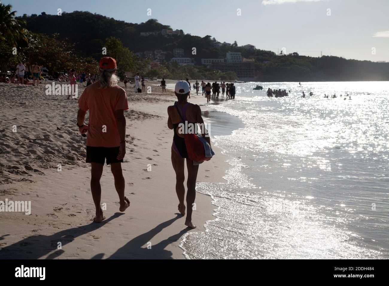 couple walking on grand anse beach grenada windward islands west indies Stock Photo
