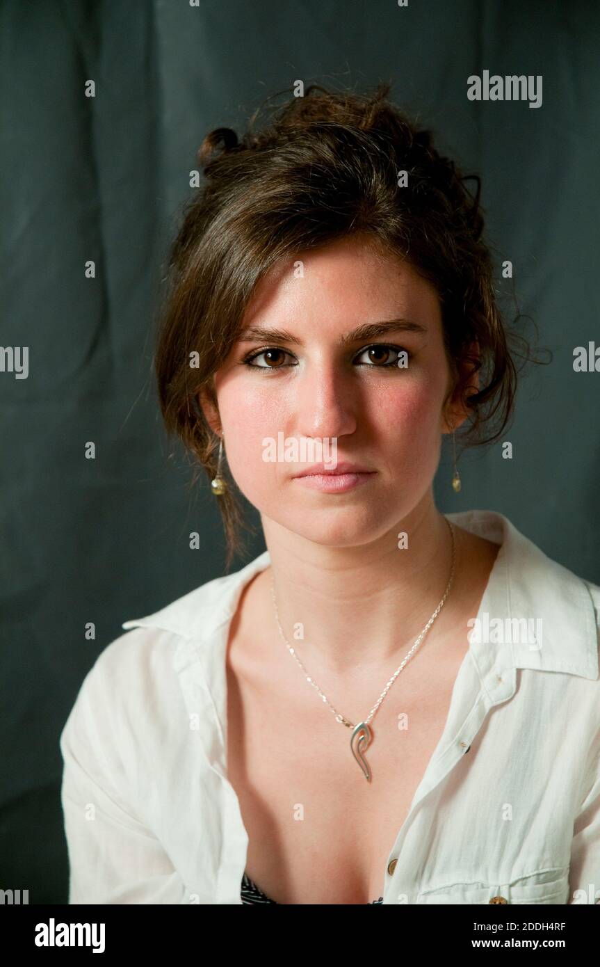 Portrait of young woman looking at the camera. Stock Photo
