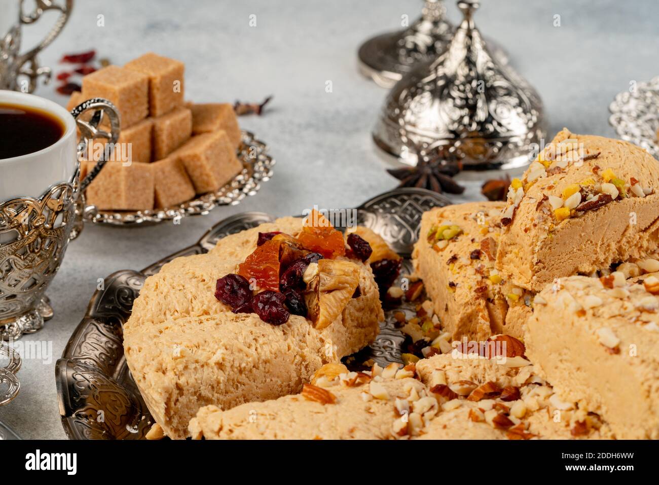 Halva with dried fruits on arabic dishware Stock Photo Alamy