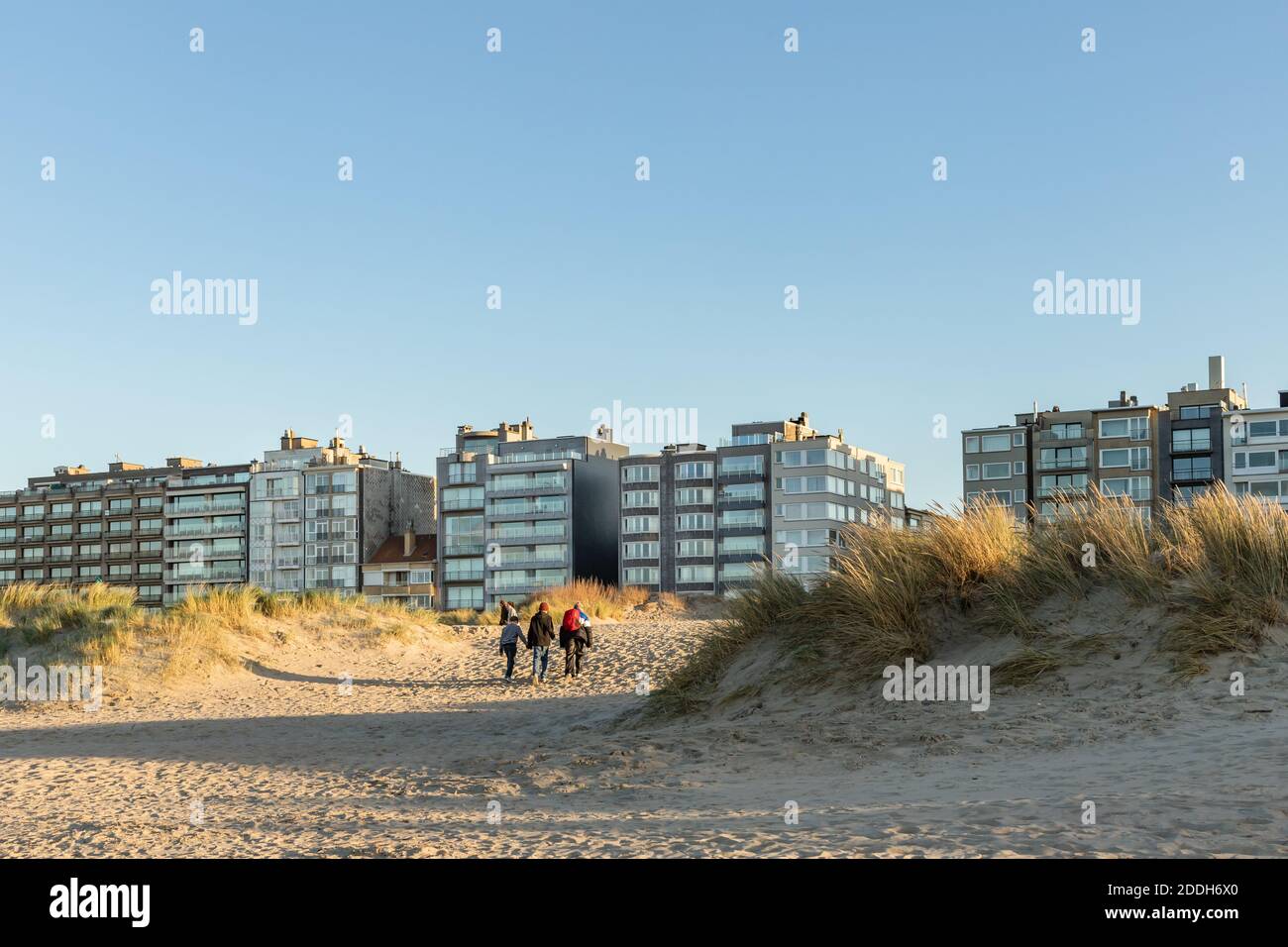 Oostduinkerke, Belgium - November 4, 2020: Appartment buildings on the Zeedijk promenade as seen from the beach Stock Photo