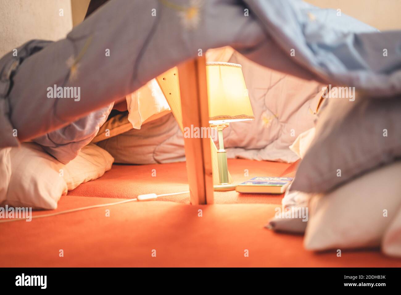 children's tent with duvets, with lamps and bookcases. Stock Photo