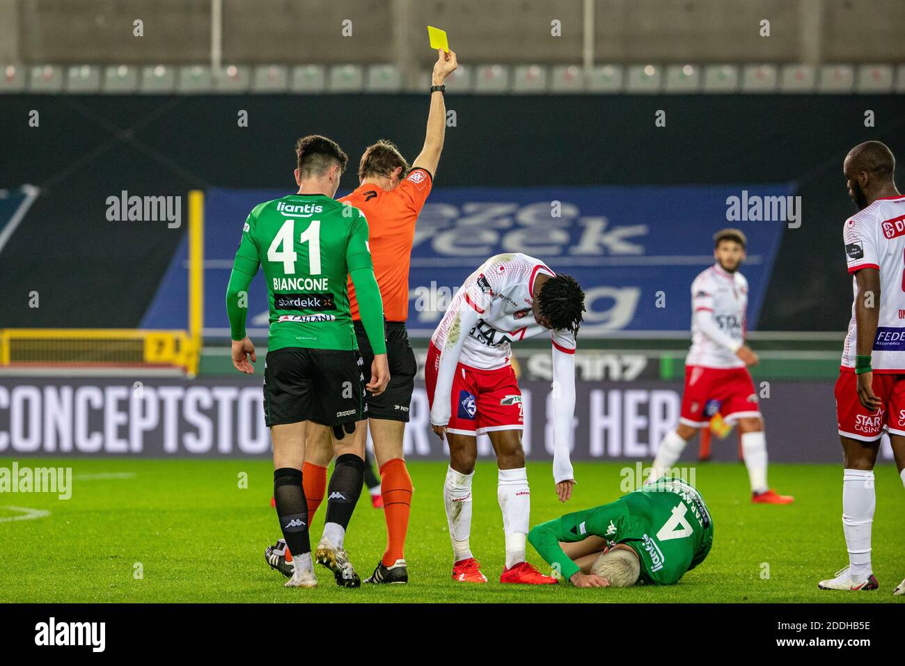 Mouscron's Eric Bocat receives a yellow card from referee Jan Boterberg during a postponed soccer match between Cercle Brugge KSV and RE Mouscron, Wed Stock Photo
