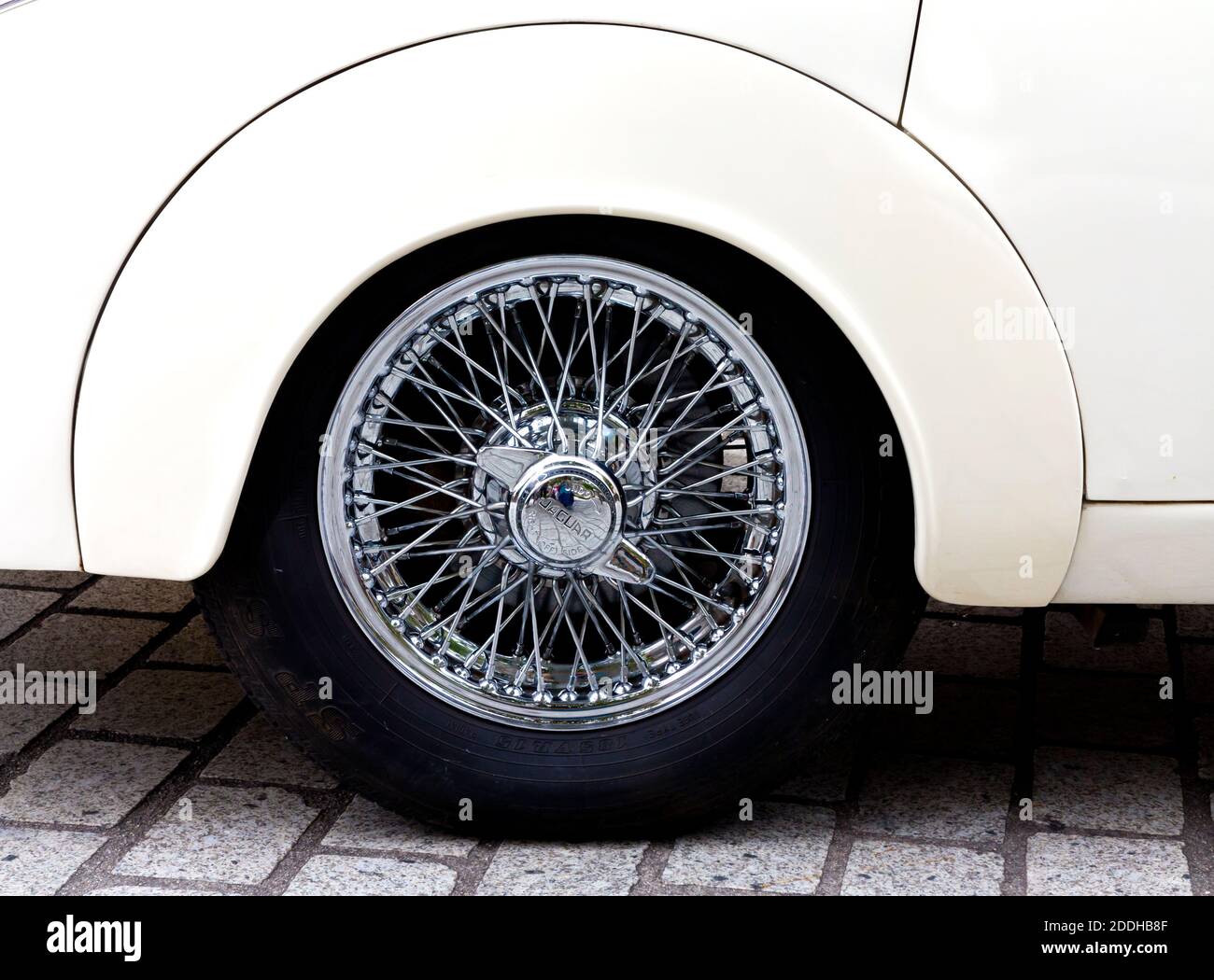 Detail of rear wheel on and spokes on Jaguar Mark 2 3.4 Litre a mid sized luxury sports saloon car produced in Coventry England from 1959 until 1967. Stock Photo