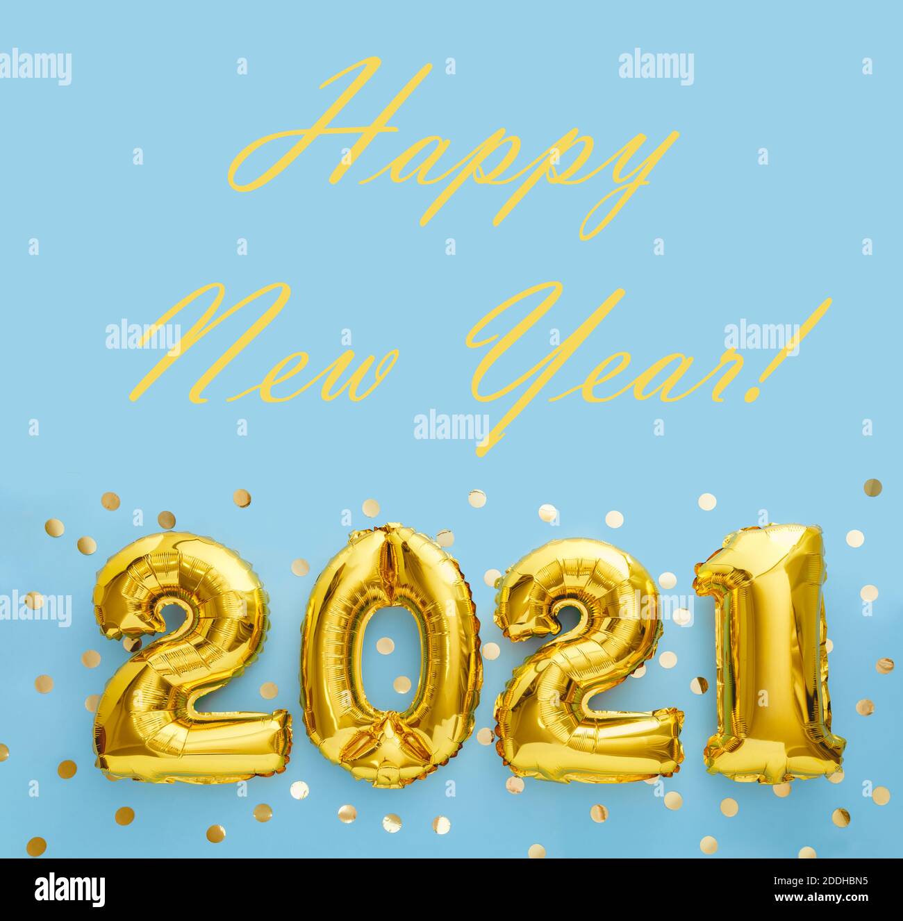 Happy New year text with gold foil balloons 2021 on blue background with confetti. New Year eve invitation 2021. Square flat lay with copy space Stock Photo
