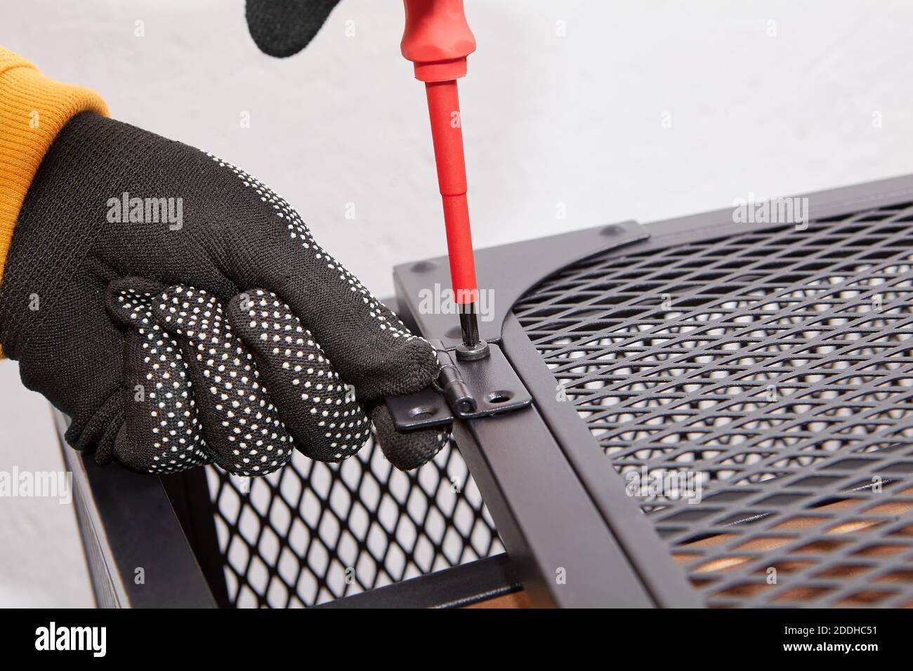 Purchaser is putting together flat pack furniture at home by yourself