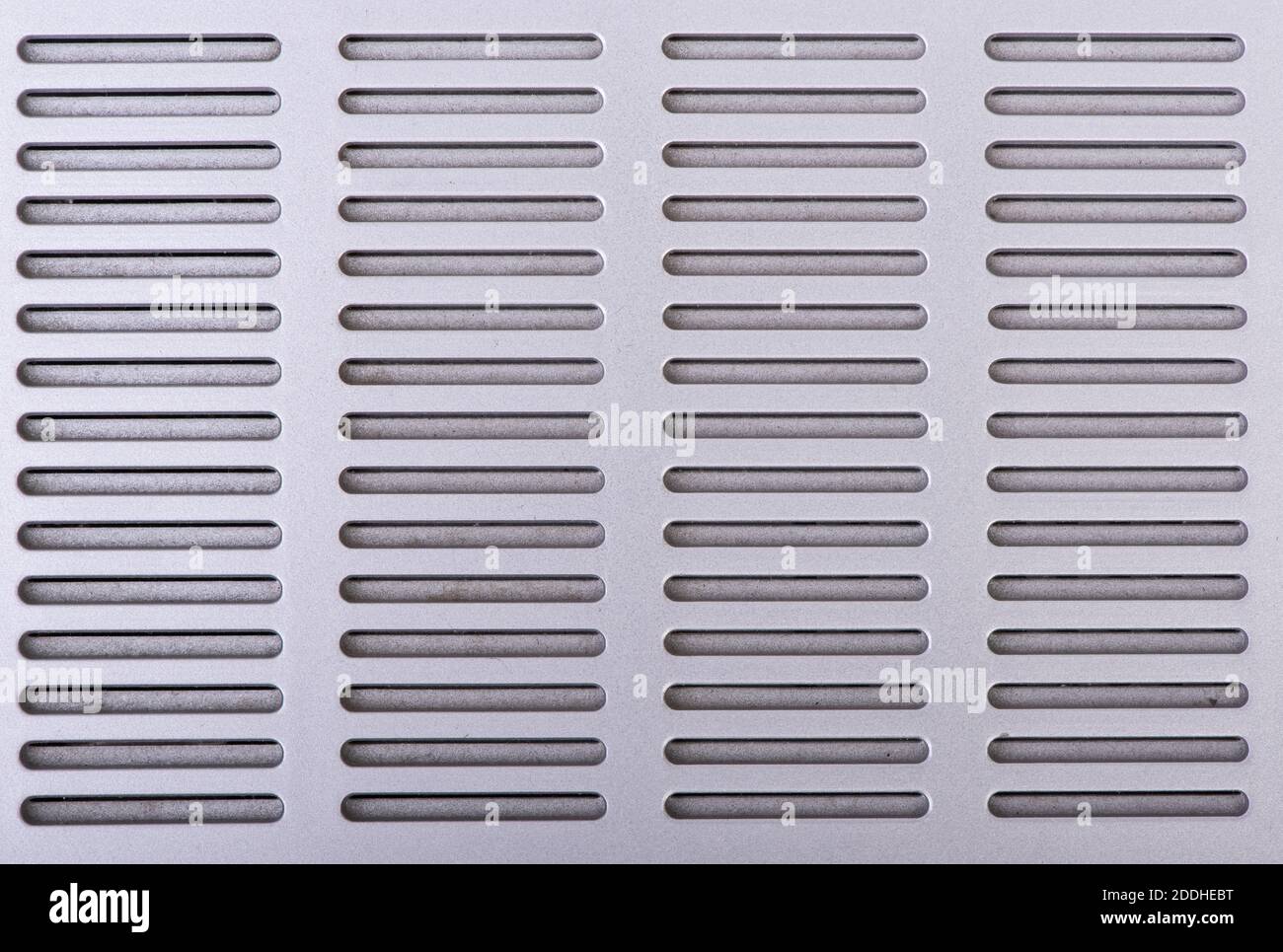 Silver perforated plastic texture with lines Stock Photo - Alamy