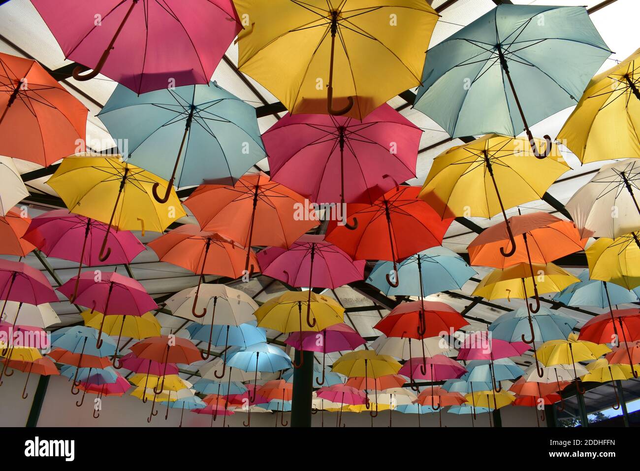 A low angle shot of seamless pattern of colorful umbrella roofing Stock Photo