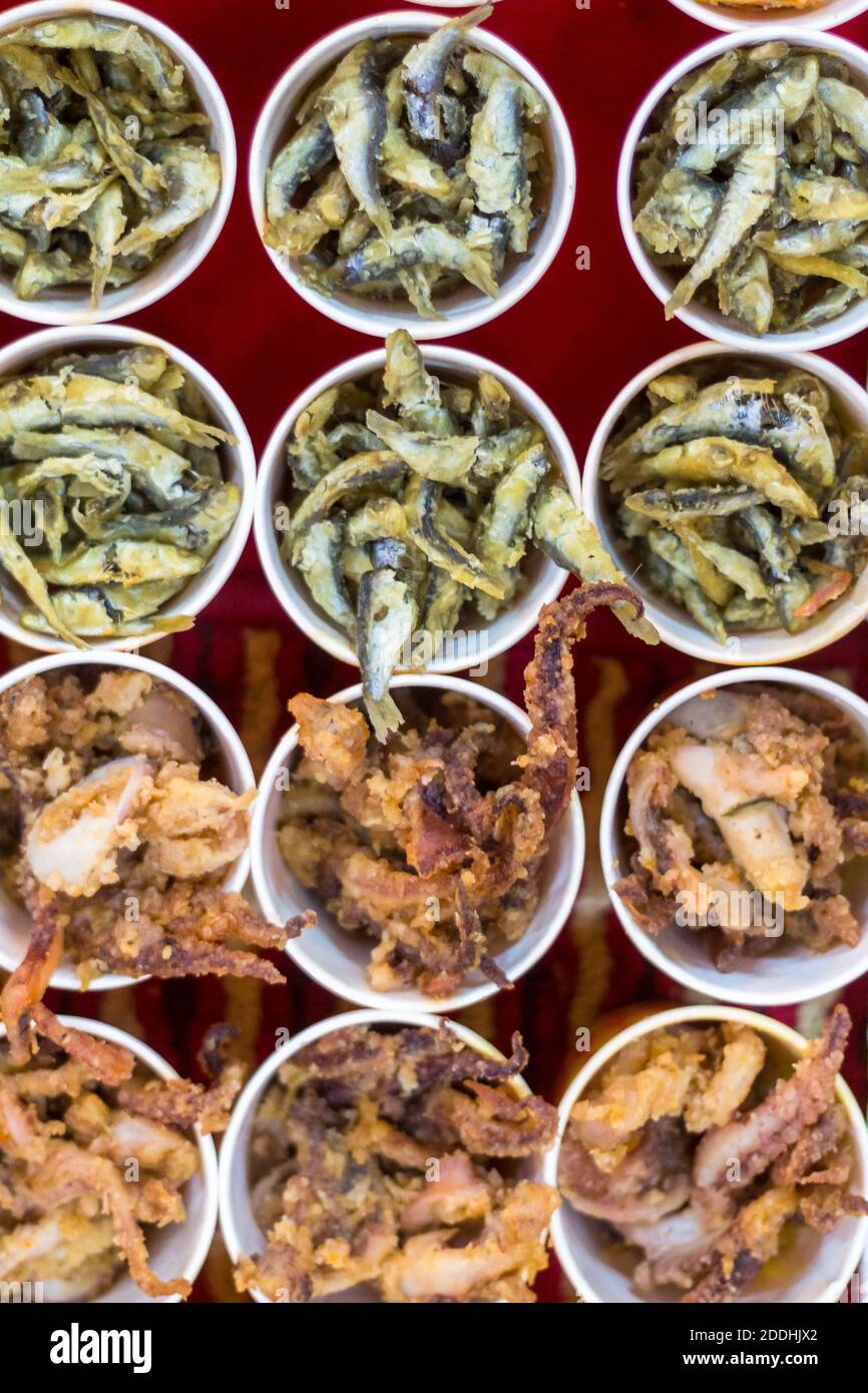 Fried seafood at a night market street food stall in Makati City, Philippines Stock Photo