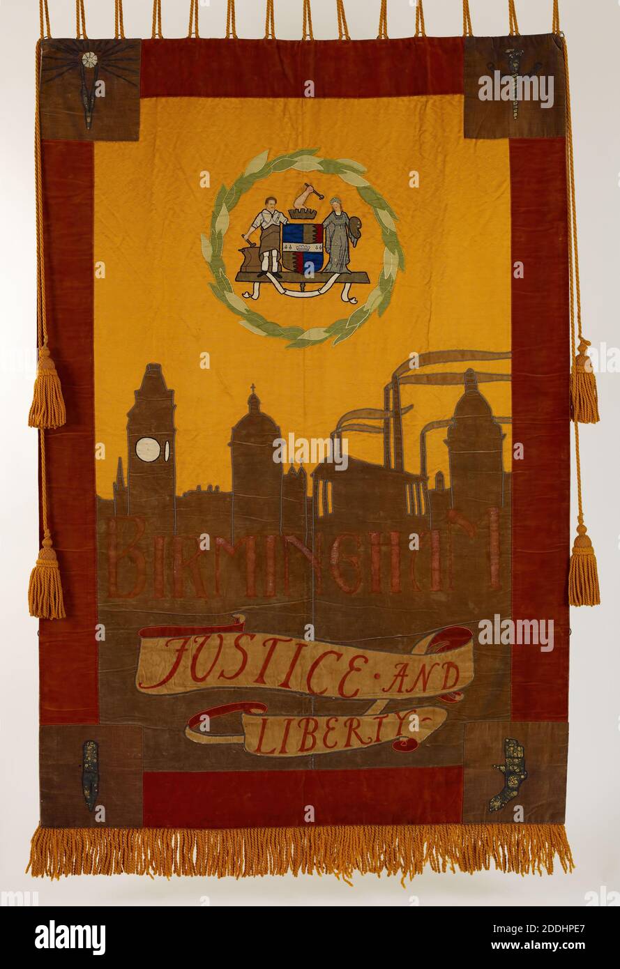 Suffragette Banner, Birmingham: Justice & Liberty, 1910-1920. Showing skyline of Birmingham with the city's coat of arms surrounded by laurel leaves Stock Photo