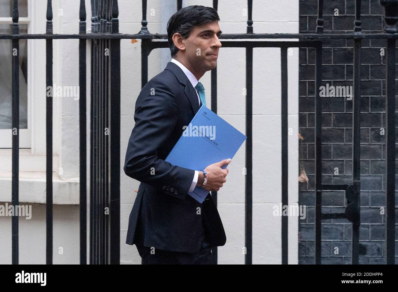 London, UK. 25th Nov, 2020. British Chancellor of the Exchequer Rishi Sunak leaves 11 Downing Street to unveil the Spending Review in London, Britain, on Nov. 25, 2020. The British economy is forecast to shrink by 11.3 percent this year, the worst recession in more than 300 years in the country as a result of the coronavirus crisis, Rishi Sunak said Wednesday. Credit: Xinhua/Alamy Live News Stock Photo