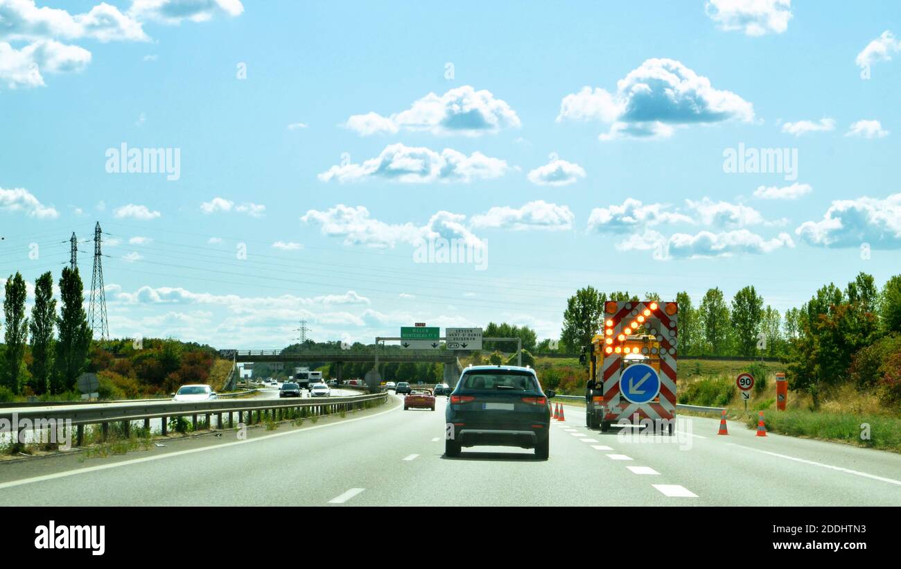 Dangerous situation on a motorway, with a change in route configuration. Stock Photo