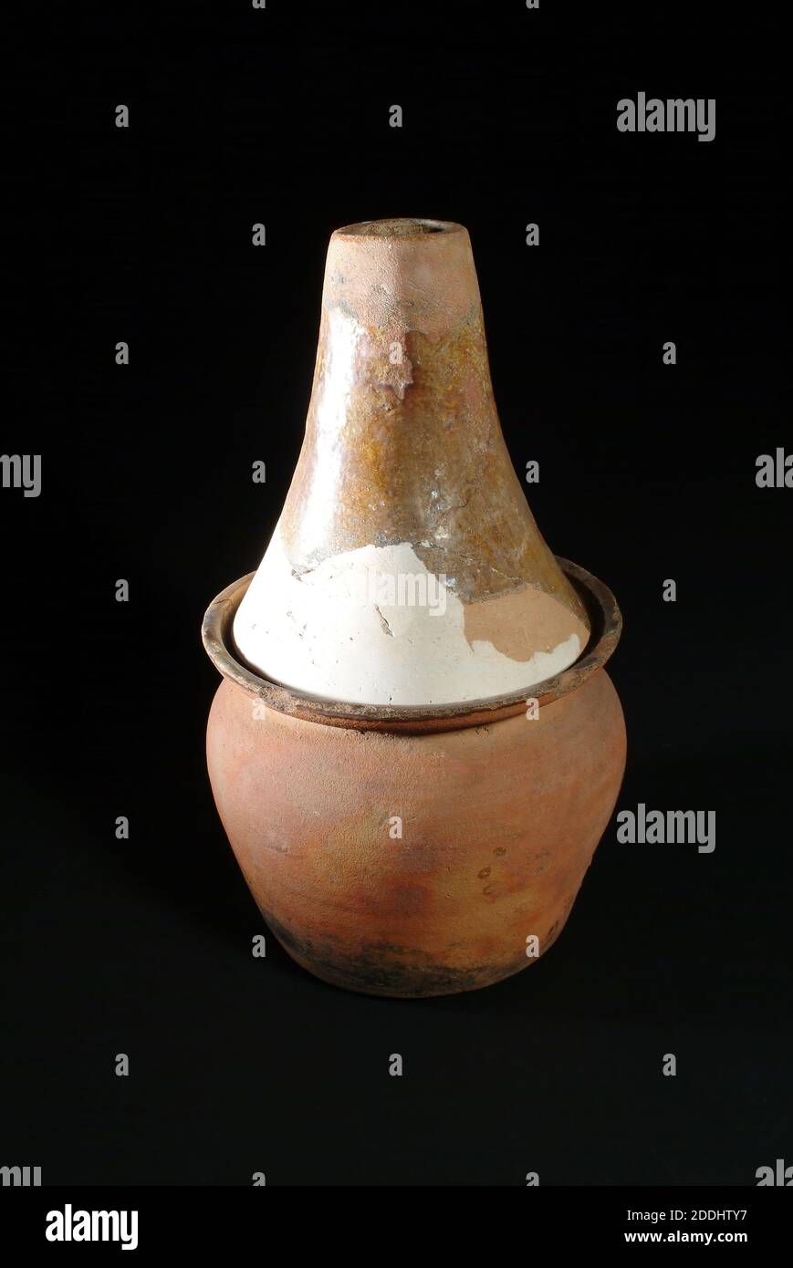 Pottery Retort, a container used for distilling liquids Found at Weoley