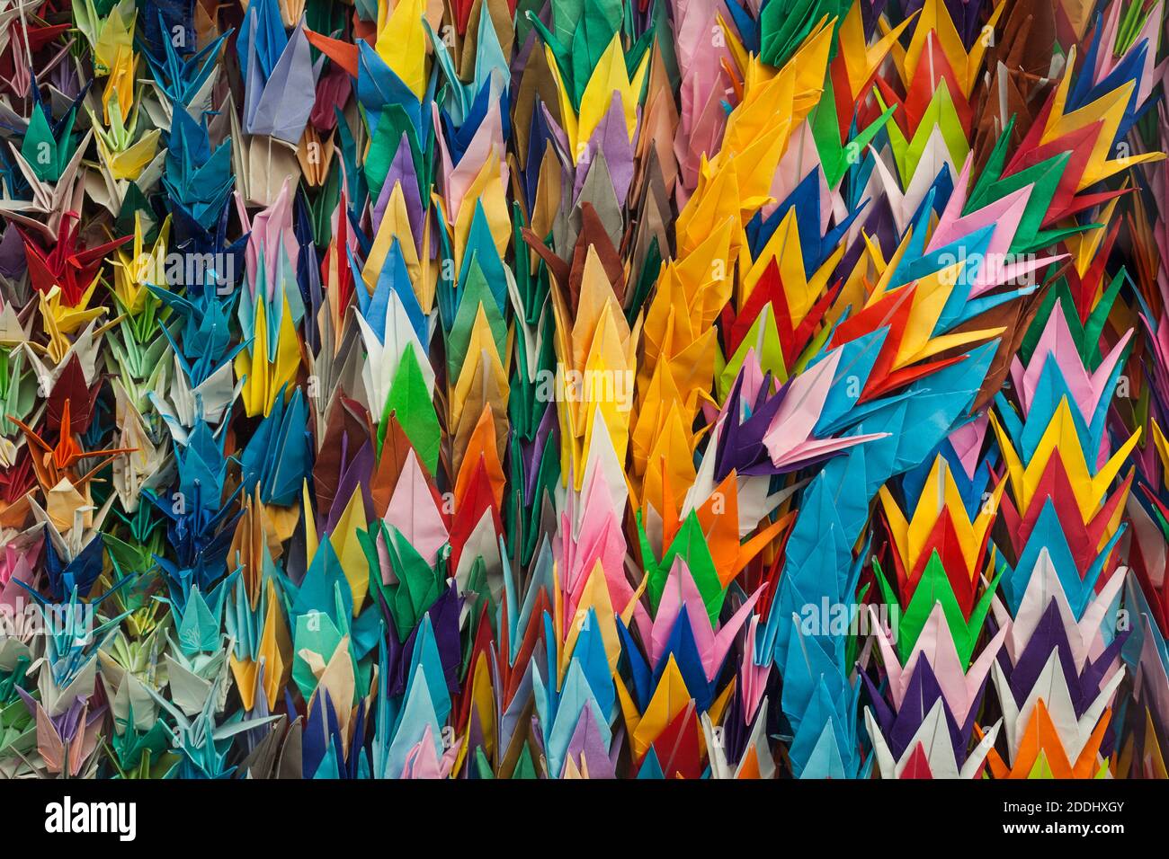 Close-up view of colorful paper cranes sent by children from all over the world close to the Children's Peace Monument, Peace Memorial Park, Hiroshima Stock Photo