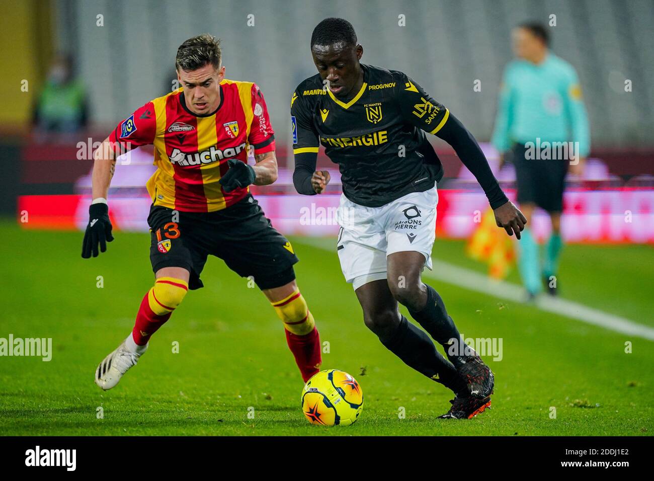 LENS, FRANCE - NOVEMBER 25: Clément Michelin of Lens, Dennis Appiah of  Nantes during the Ligue 1 match between RC Lens and FC Nantes at Stade  Bollaert-Delelis on november 25, 2020 in