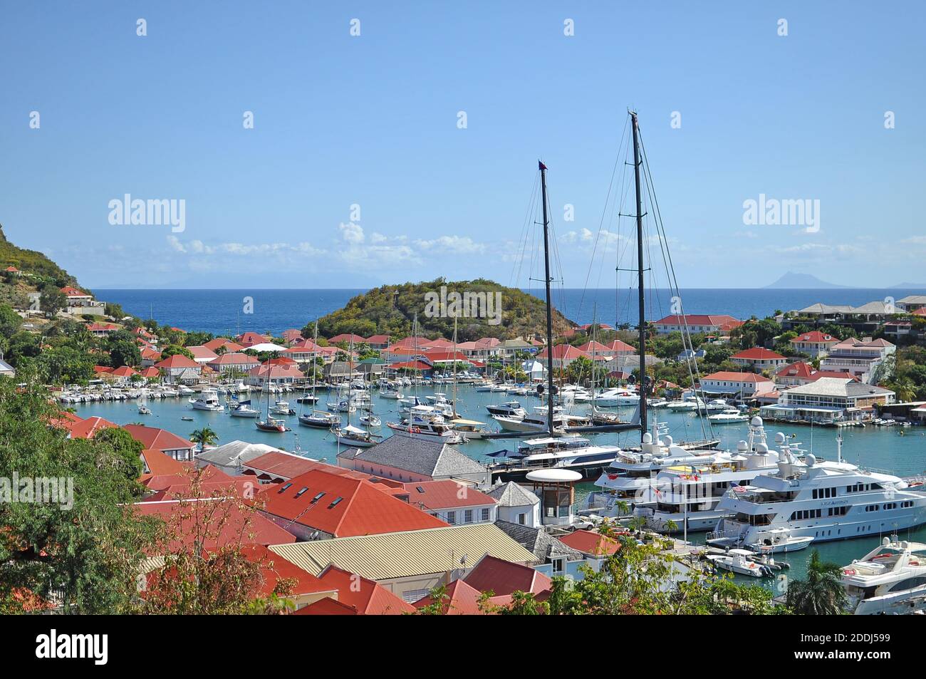 View at the St.Barth marina harbour with luxury yachts and blue sky and ...