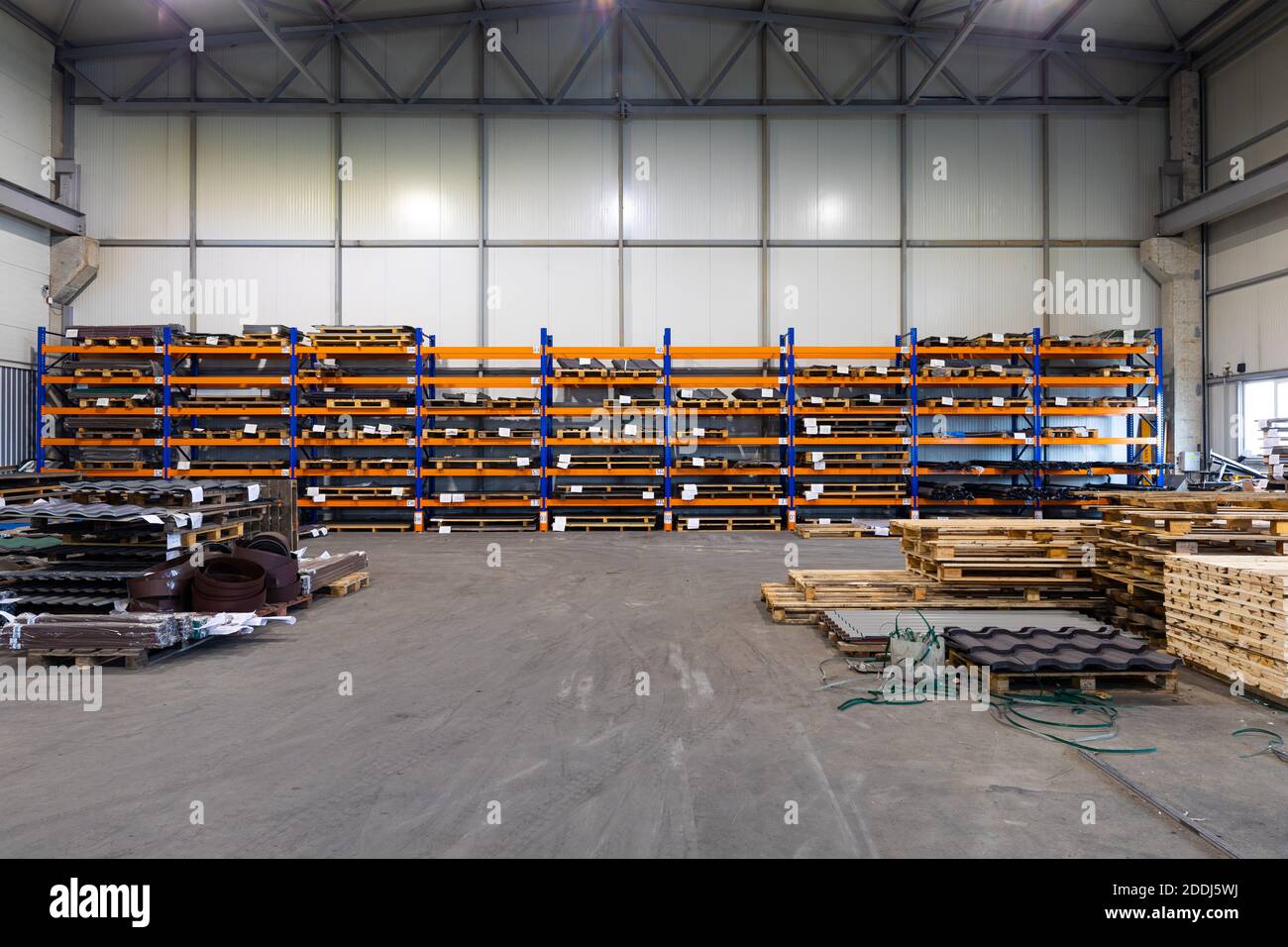 industrial warehouse with high racks Stock Photo - Alamy