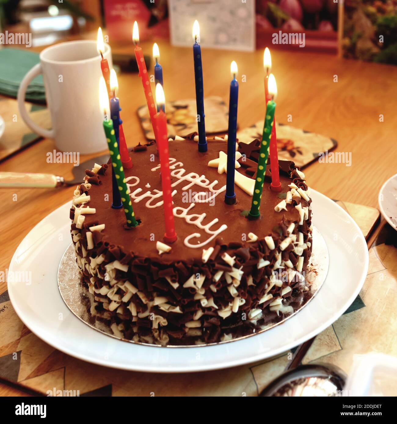 chocolate birthday cake with candles Stock Photo - Alamy