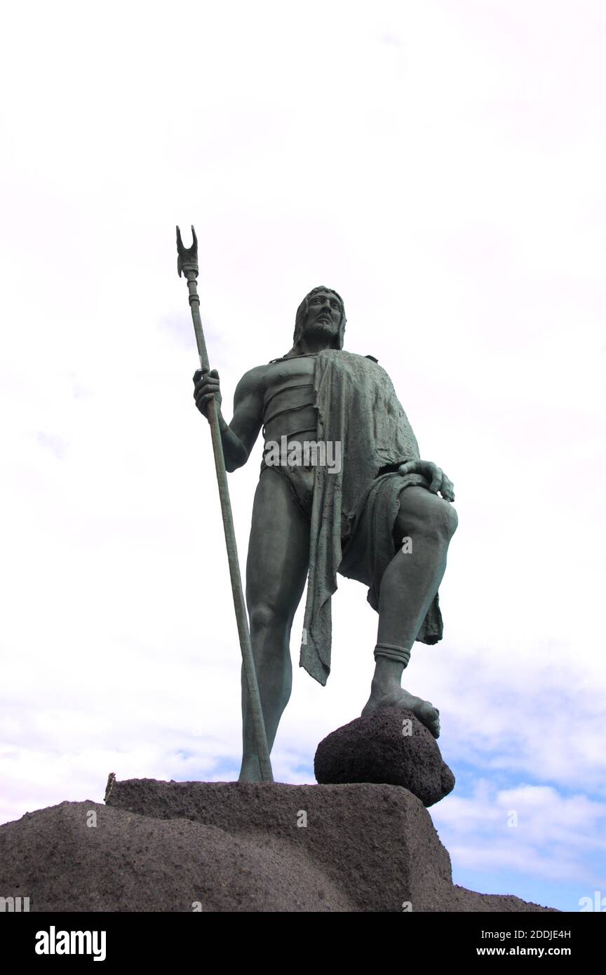 View from the ground of a Bronze statue representing King Mencey Tegueste II, created by José Abad, located in the Plaza de La Candelaria, Tenerife, C Stock Photo