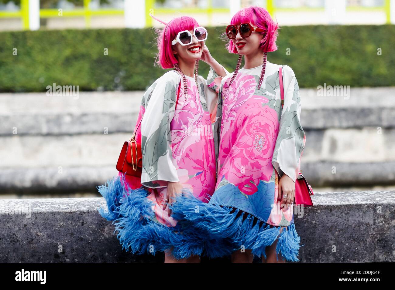 Street style, Ami and Aya Suzuki arriving at Valentino Spring-Summer 2020  ready-to-wear show, held at Invalides, Paris, France, on September 29,  2019. Photo by Marie-Paola Bertrand-Hillion/ABACAPRESS.COM Stock Photo -  Alamy