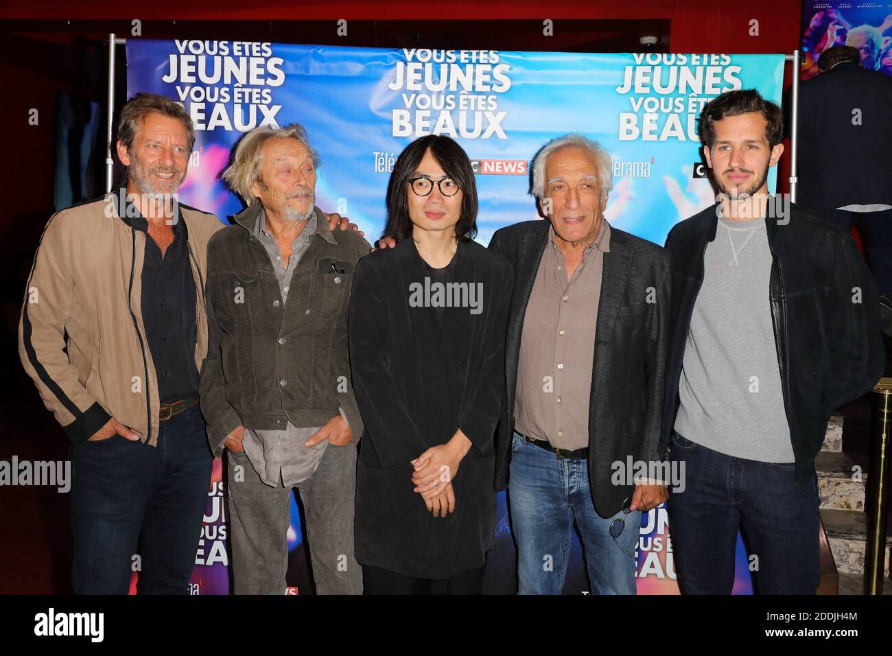 vincent winterhalter patrick bouchitey director franchin don gerard darmon victor belmondo attending the premiere of vous etes jeunes vous etes beaux premiere held at the gaumont opera in paris france on september