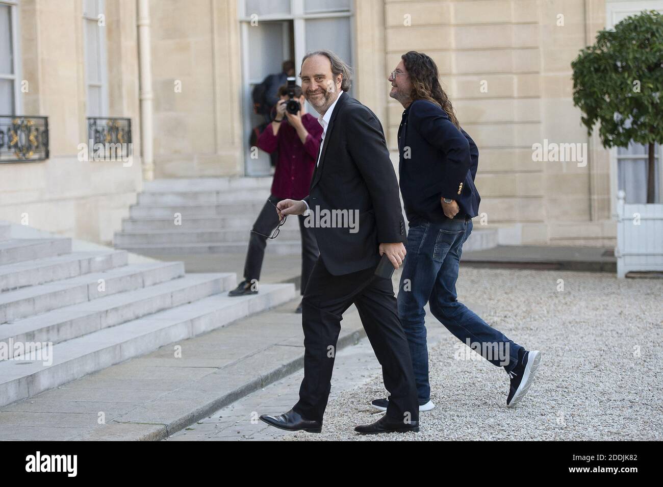 Veepee's CEO Jacques-Antoine Granjon (R) and Iliad's founder Xavier Niel  (L) arrive on September 17, 2019 at the Elysee presidential palace in Paris  to attend a meeting with French President and tech