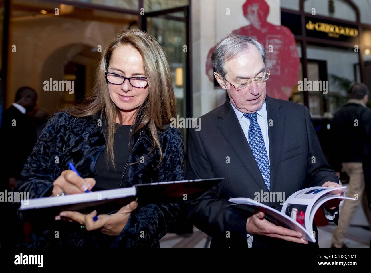 Laurence Jenkell, sculptor, signing the book for Claude Guéant, French politician, ceremony of the Exposition GV Monumental for FIAC, Hotel Prince de Galles, Paris, France. Photo by Jana Call me J/ABACAPRESS.COM Stock Photo
