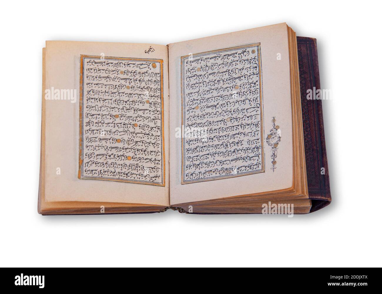 Old arabic holy Quran also romanized Qur'an or Koran, is the central religious text of Islam. Antique book  with hand coloring in gold. Image showing Stock Photo