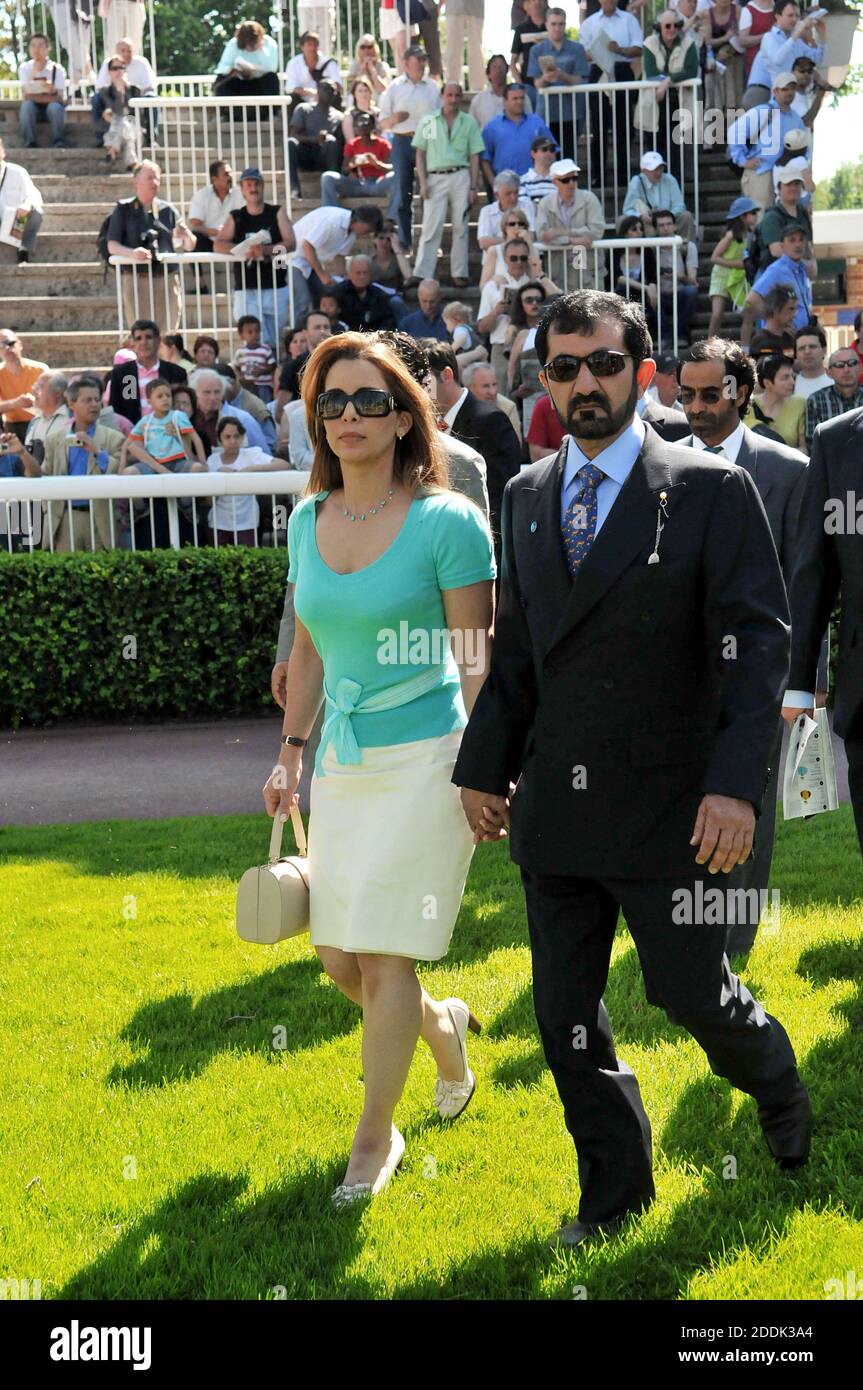 File photo - Jordan's Princess Haya and her husband, Dubai's ruler, Sheikh Mohammed Bin Rashed Al Maktoum attend colts race, known as 'Poule d'Essai des Poulains' at Longchamp racecourse in Paris, France, on May 11, 2008. The younger wife of the ruler of Dubai, the billionaire race horse owner Sheikh Mohammed bin Rashid al-Maktoum, is believed to be staying in a town house near Kensington Palace after fleeing her marriage. Princess Haya bint al-Hussein, 45, has not been seen in public for weeks. One half of one of the sporting world’s most celebrated couples, she failed to appear at Royal Asco Stock Photo