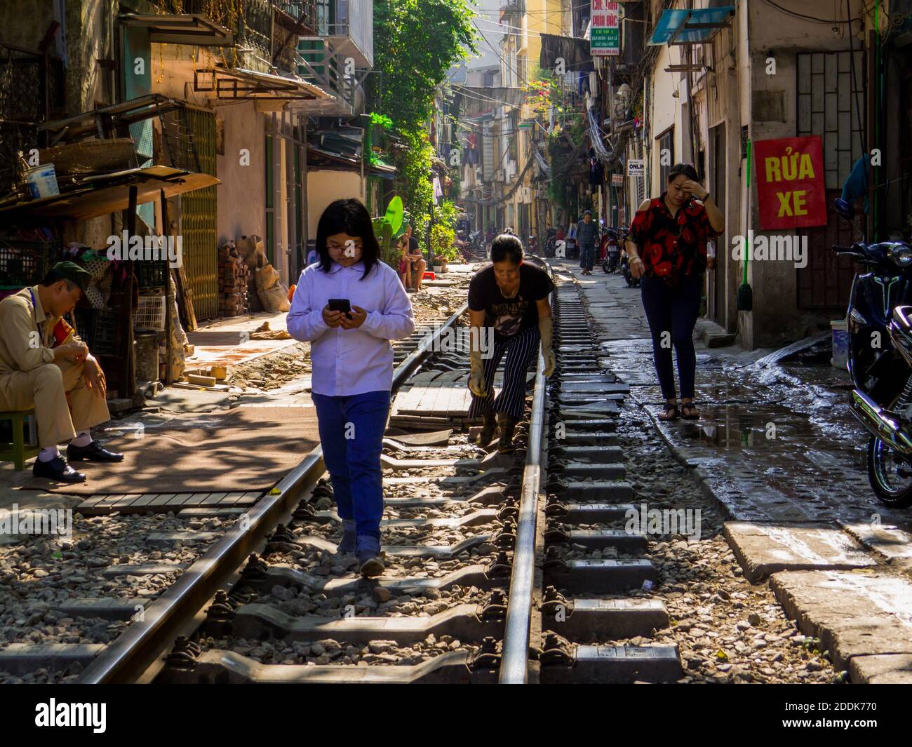 Crossing The Road In Vietnam Stock Photo - Download Image Now