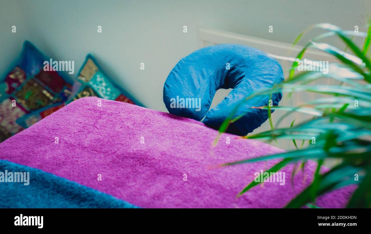 A selective focus shot of an empty massage table bed in a spa salon Stock Photo
