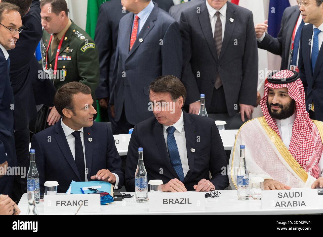 File photo dated June 28, 2019 of Emmanuel Macron, Jair Bolsonaro, Crown Prince Mohammed bin Salma during a meeting on world economy at the first day of the G20 Summit in Osaka, Japan. On his official Facebook account, the Brazilian president endorsed, Saturday, August 24, an offensive comment against the wife of Emmanuel Macron. Under one of his posts about the sending of armed forces to fight fires, Bolsonaro reacted to a comment mocking the physique of the French First Lady - appearing on a disadvantageous photo - by comparing it to that of Michelle Bolsonaro (37), radiant on the day of the Stock Photo