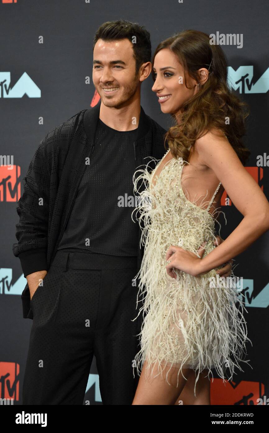 Kevin Jonas and wife Danielle Jonas pose in the Press Room during the ...
