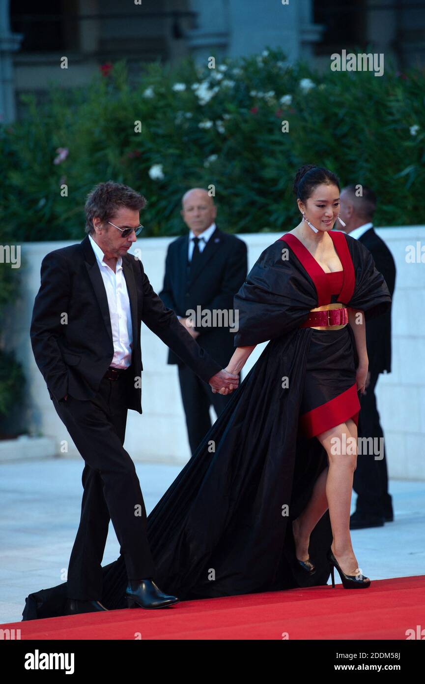 Jean-Michel Jarre and Gong Li attending the Saturday Fiction Premiere