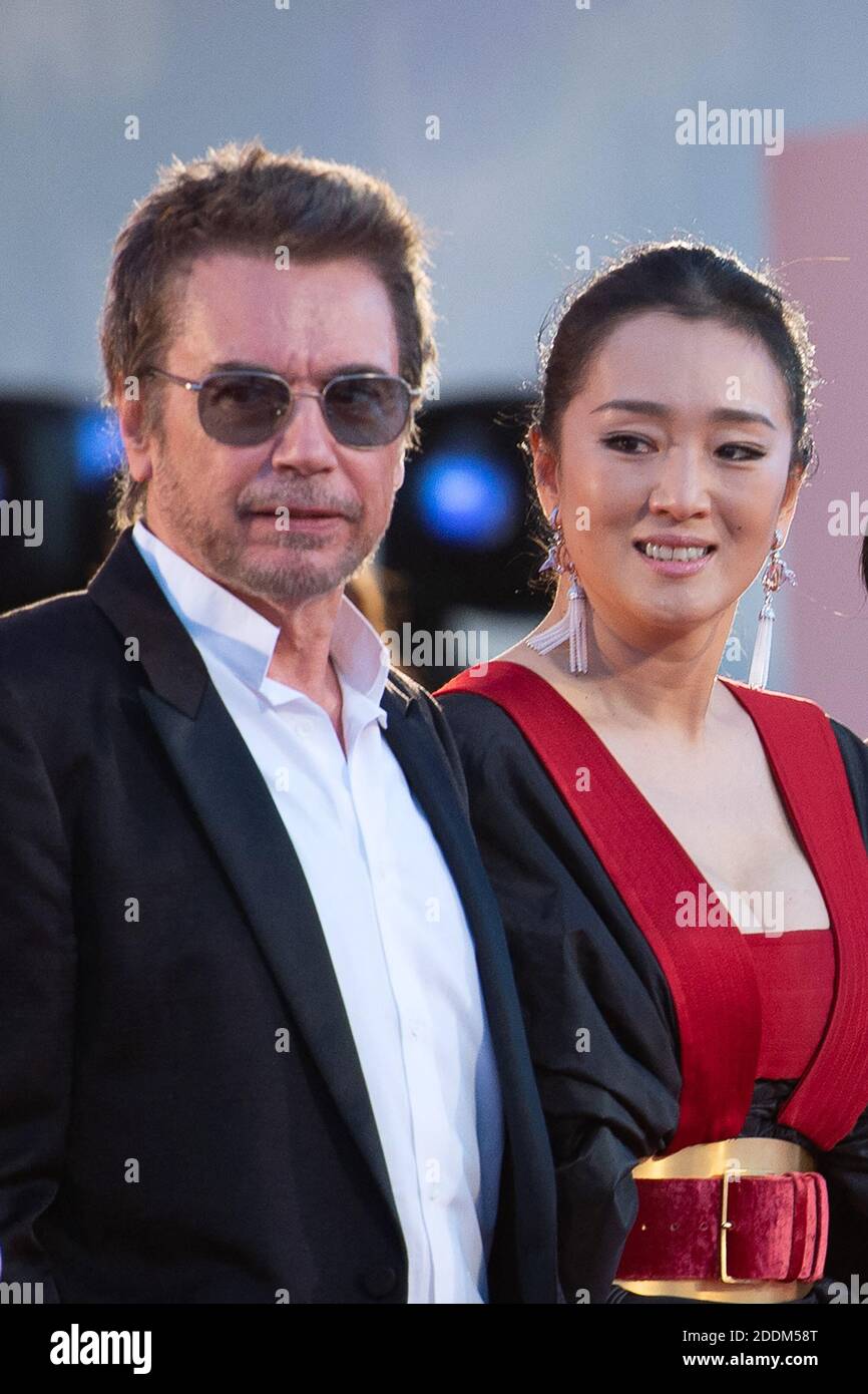 Jean-Michel Jarre and Gong Li attending the Saturday Fiction Premiere