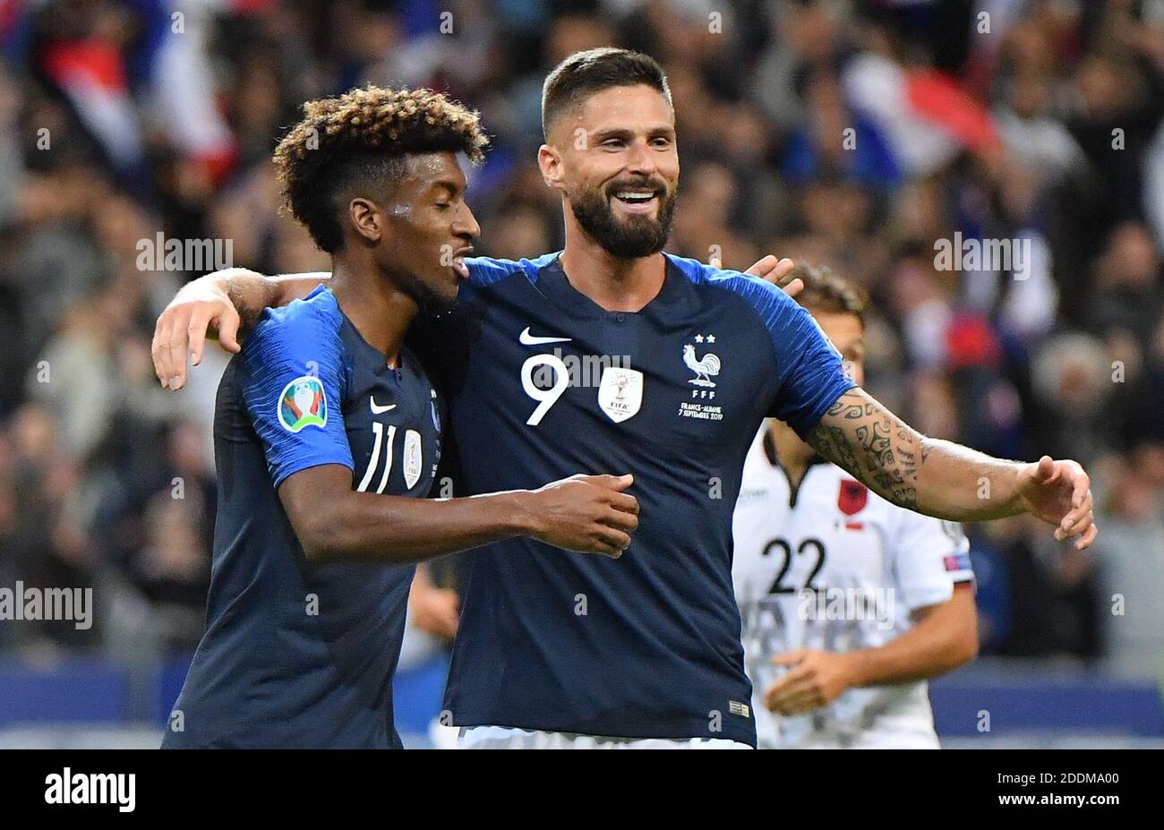 France's Kingsley Coman and Olivier Giroud celebrates during the UEFA Euro  2020 qualifying Group H football match France v Albania at the Stade de  France stadium in Paris on September 7, 2019.