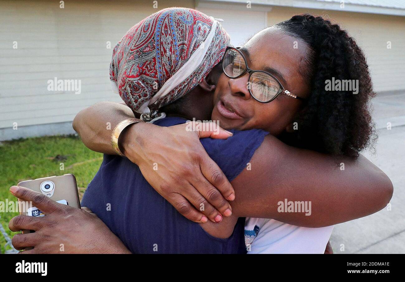 NO FILM, NO VIDEO, NO TV, NO DOCUMENTARY - Angela Dean, right, a pastry chef and the only Bahamian crew member on Royal Caribbean's Mariner of the Seas cruise ship, reunites with her sister, Lisa Duhaney, in Freeport on Grand Bahama Island, on Saturday, September 7, 2019. It was the first time the sisters have seen each other since Hurricane Dorian devastated the island. Photo by Joe Burbank/Orlando Sentinel/TNS/ABACAPRESS.COM Stock Photo